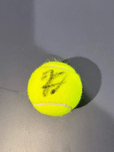 John Isner potpisao je legendu za autogramiranu tenisku loptu s COA -om
